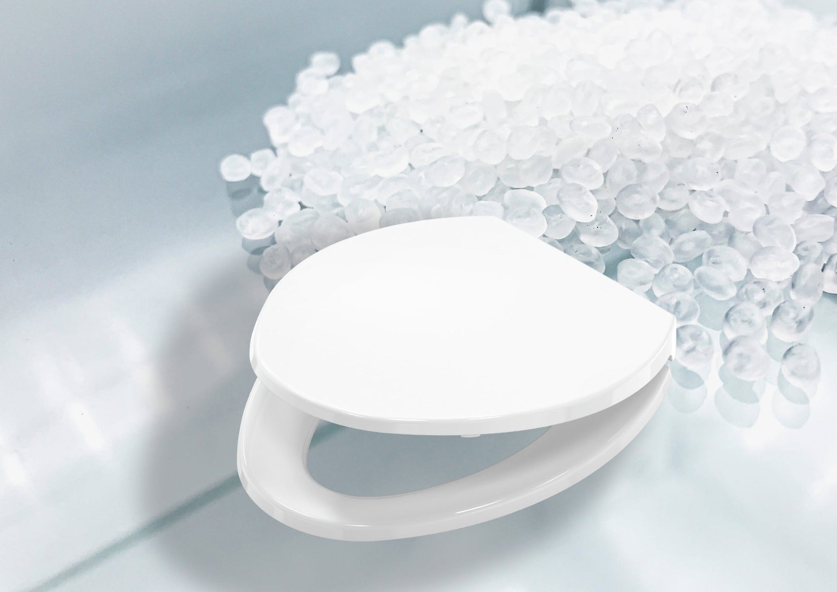 White plastic component on a light gray background with white granules.
Topseat Plastic Toilet Seats
Topseat Elongated Toilet Seats