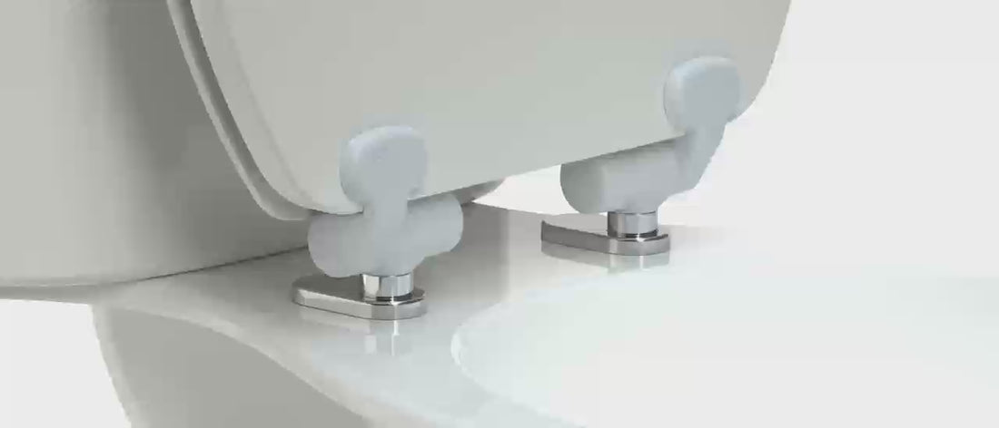 Animation demonstrating the Topseat Magic Hinge® quick-release toilet seat being removed and reattached to its metal hinge bases.