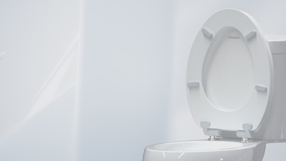 Topseat HushMotion™ toilet seat gently closing, highlighting a smooth, quiet, and no-slam experience.