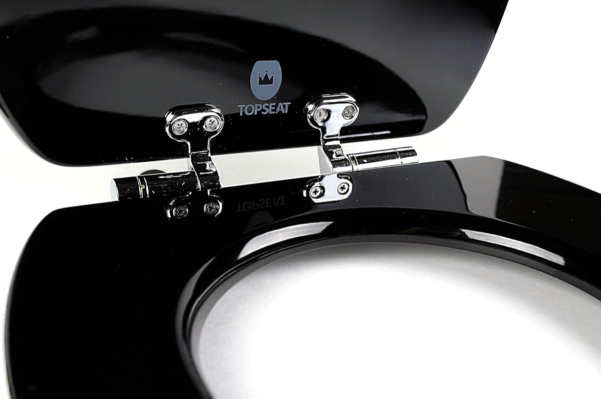 Close-up of chromed slow-close hinges on a glossy black topseat wood toilet seat with the lid raised