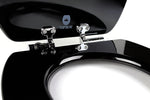 Close-up of chromed slow-close hinges on a glossy black topseat wood-composite toilet seat with the lid raised