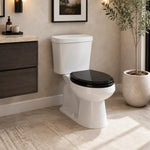 topseat Pro Elite black round wood toilet seat installed on a white toilet in a modern bathroom