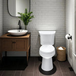 Topseat Pro round white wood toilet seat installed in a modern minimalist bathroom.